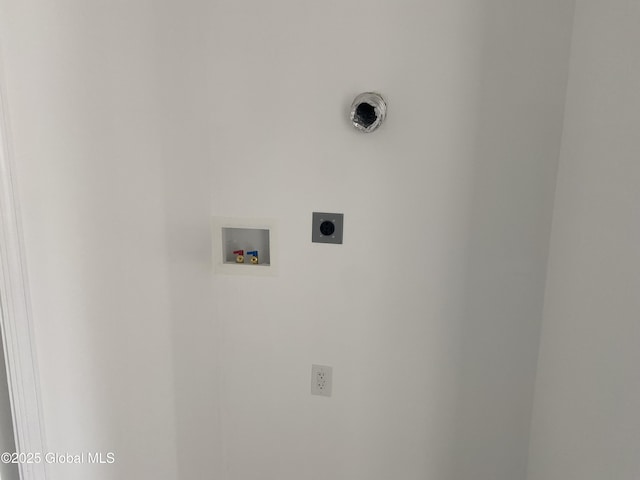 laundry room featuring electric dryer hookup, hookup for a washing machine, and laundry area