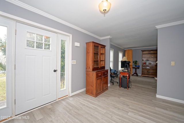 18 Molly White Dr, Coxsackie, NY 12051 - entrance foyer featuring light wood-style flooring, crown molding, and a wealth of natural light