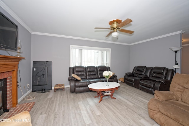 18 Molly White Dr, Coxsackie, NY 12051 - living room with baseboards, a fireplace, a ceiling fan, crown molding, and wood finished floors