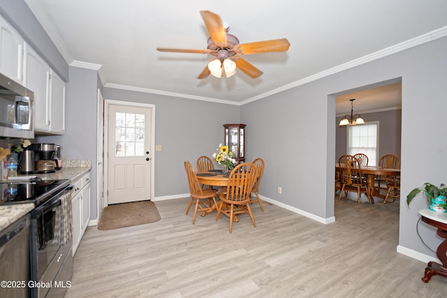 18 Molly White Dr, Coxsackie, NY 12051 - kitchen with light wood-type flooring, white cabinetry, ornamental molding, stainless steel appliances, and baseboards
