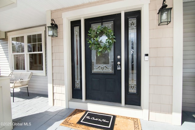 entrance to property with covered porch