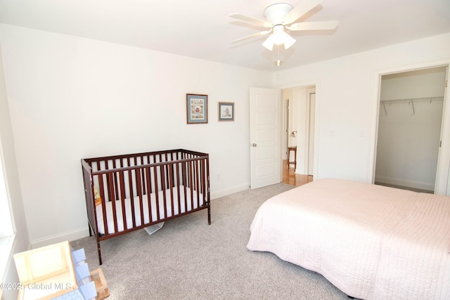 bedroom featuring a ceiling fan, carpet floors, and baseboards