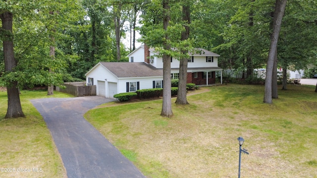 15 Garrison Ln, Clifton Park, NY 12019 - traditional home featuring a garage and driveway