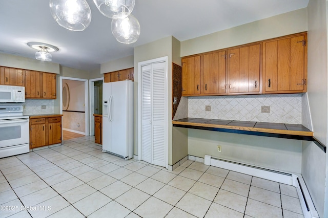 15 Garrison Ln, Clifton Park, NY 12019 - kitchen with white appliances, brown cabinetry, decorative backsplash, light tile patterned flooring, and a baseboard radiator