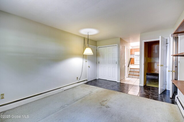 15 Garrison Ln, Clifton Park, NY 12019 - entryway featuring a baseboard radiator and dark tile patterned flooring