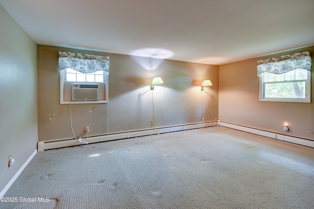 15 Garrison Ln, Clifton Park, NY 12019 - carpeted empty room featuring healthy amount of natural light, a baseboard heating unit, and cooling unit