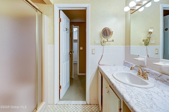 15 Garrison Ln, Clifton Park, NY 12019 - full bath featuring vanity, wainscoting, a stall shower, tile patterned floors, and baseboard heating