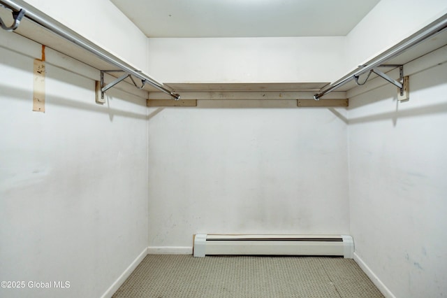 15 Garrison Ln, Clifton Park, NY 12019 - walk in closet with a baseboard radiator and carpet