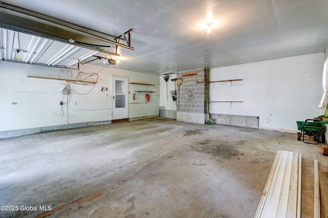 15 Garrison Ln, Clifton Park, NY 12019 - garage featuring a garage door opener