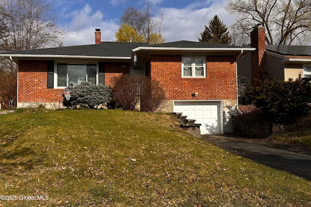 single story home featuring an attached garage, brick siding, aphalt driveway, and a chimney