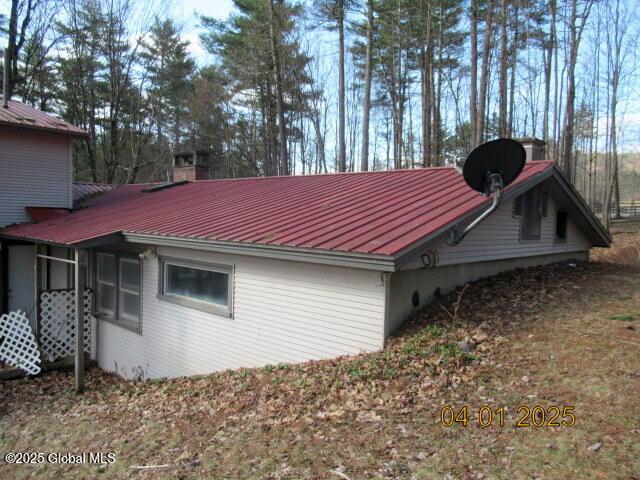 545 Stage Rd, Cambridge, NY 12028 - view of side of home featuring metal roof