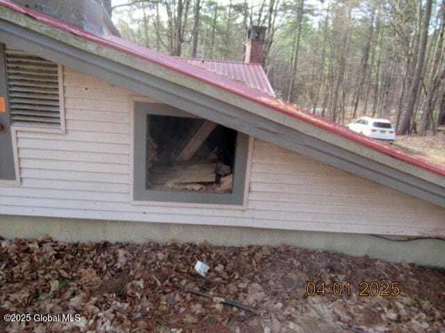 545 Stage Rd, Cambridge, NY 12028 - view of side of property with a chimney and metal roof