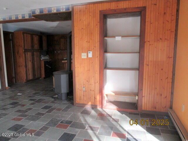 545 Stage Rd, Cambridge, NY 12028 - interior space featuring wood walls and a wood stove