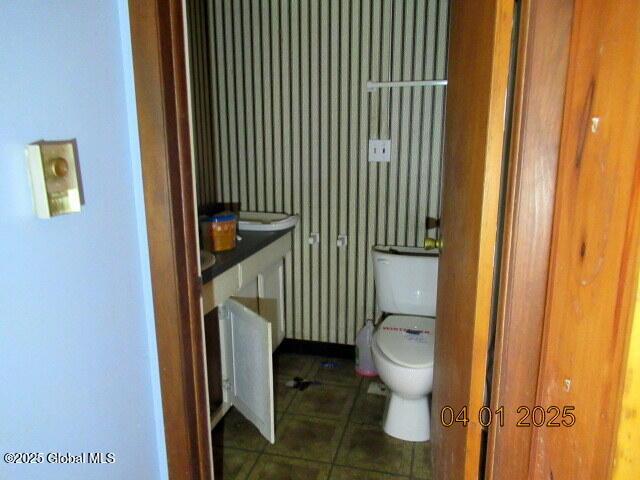 545 Stage Rd, Cambridge, NY 12028 - bathroom with toilet, tile patterned floors, and vanity