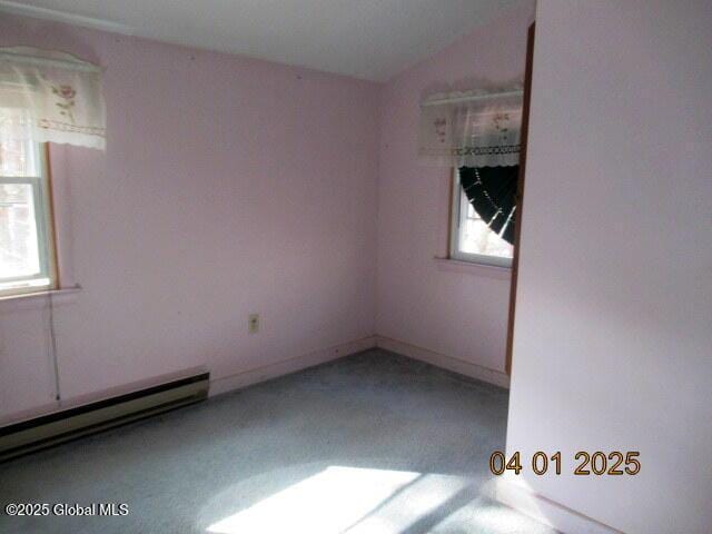 545 Stage Rd, Cambridge, NY 12028 - spare room featuring lofted ceiling and a baseboard radiator