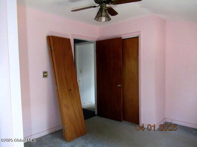 545 Stage Rd, Cambridge, NY 12028 - unfurnished bedroom with baseboards and ceiling fan