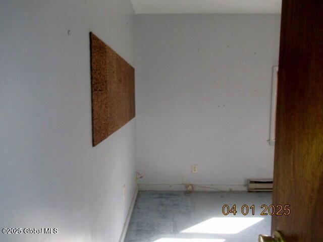 545 Stage Rd, Cambridge, NY 12028 - unfurnished room featuring a baseboard heating unit