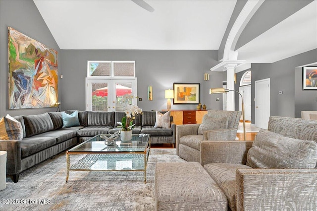 101 E Krumkill Rd, Albany, NY 12208 - living area with vaulted ceiling, ornate columns, ceiling fan, wood finished floors, and arched walkways