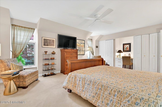 101 E Krumkill Rd, Albany, NY 12208 - bedroom featuring multiple closets, carpet flooring, ceiling fan, and baseboards