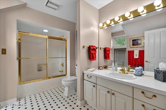 101 E Krumkill Rd, Albany, NY 12208 - bathroom with toilet, vanity, and bath / shower combo with glass door