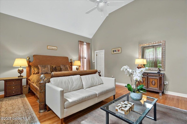 101 E Krumkill Rd, Albany, NY 12208 - bedroom featuring high vaulted ceiling, baseboards, light wood-type flooring, and a ceiling fan
