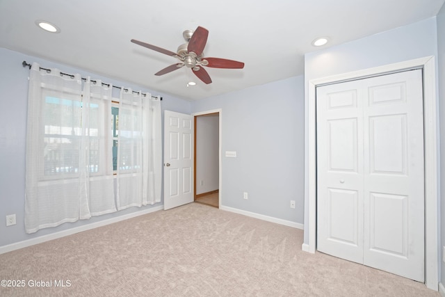 unfurnished bedroom featuring a ceiling fan, baseboards, carpet floors, a closet, and recessed lighting