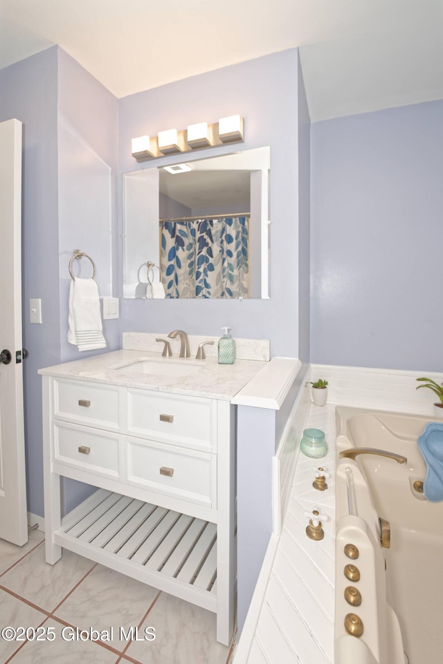 bathroom featuring a tub and vanity
