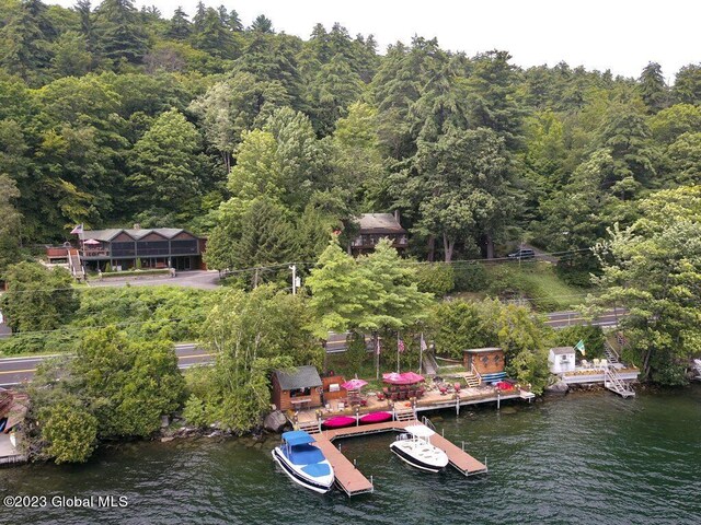 9667 Lake Shore Dr, Hague, NY 12836 - dock featuring a wooded view and a water view