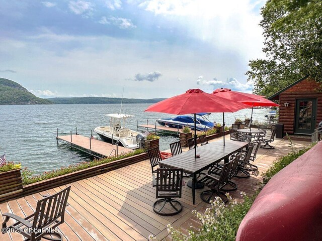 9667 Lake Shore Dr, Hague, NY 12836 - dock featuring a water view and outdoor dining space