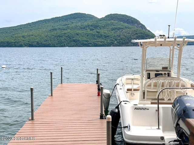 9667 Lake Shore Dr, Hague, NY 12836 - dock featuring a water and mountain view and a view of trees