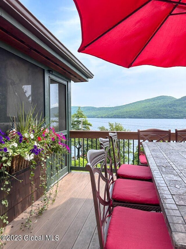9667 Lake Shore Dr, Hague, NY 12836 - wooden terrace featuring a water view