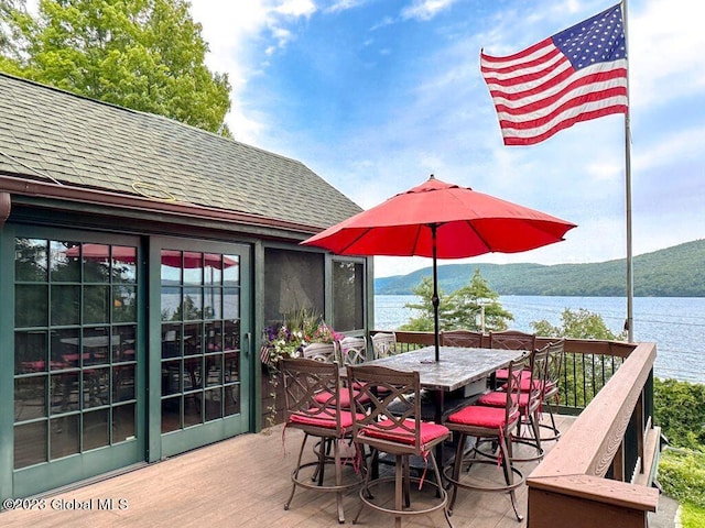 9667 Lake Shore Dr, Hague, NY 12836 - wooden terrace featuring a water and mountain view and outdoor dining area