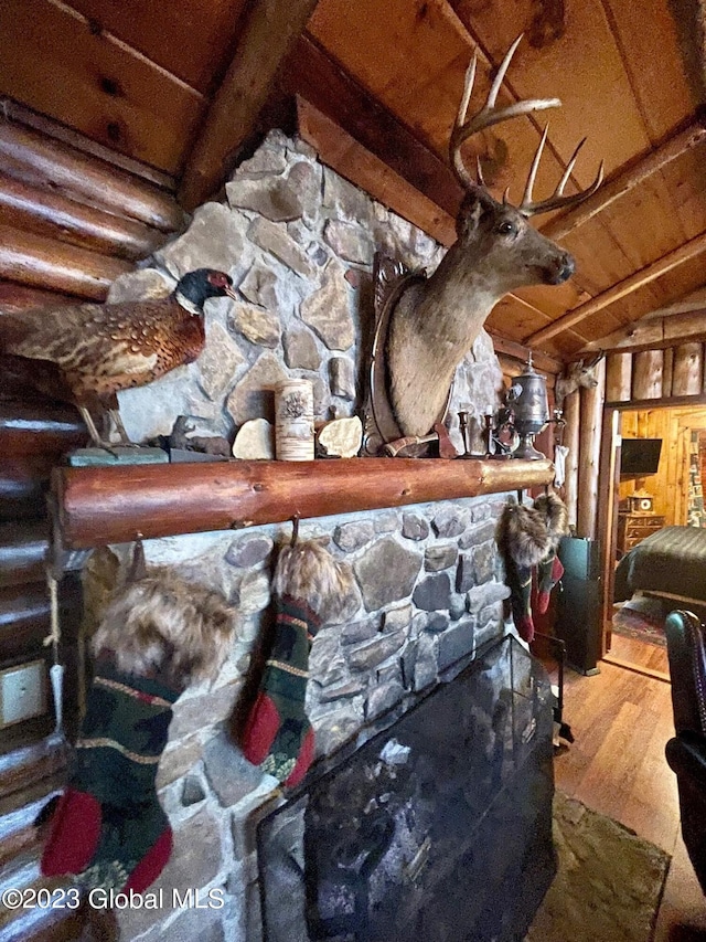 9667 Lake Shore Dr, Hague, NY 12836 - detailed view of wood finished floors and wood ceiling with exposed beams