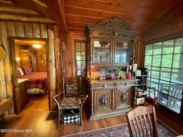 9667 Lake Shore Dr, Hague, NY 12836 - indoor dry bar featuring lofted ceiling, wood-type flooring, wood walls, and wood ceiling