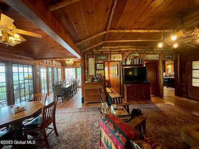 9667 Lake Shore Dr, Hague, NY 12836 - living room with wood ceiling, wood-type flooring, plenty of natural light, wood walls, and ceiling fan