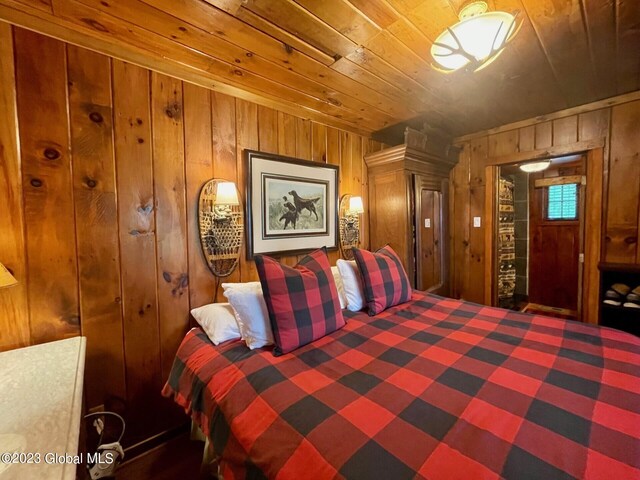 9667 Lake Shore Dr, Hague, NY 12836 - bedroom with wooden walls and wooden ceiling