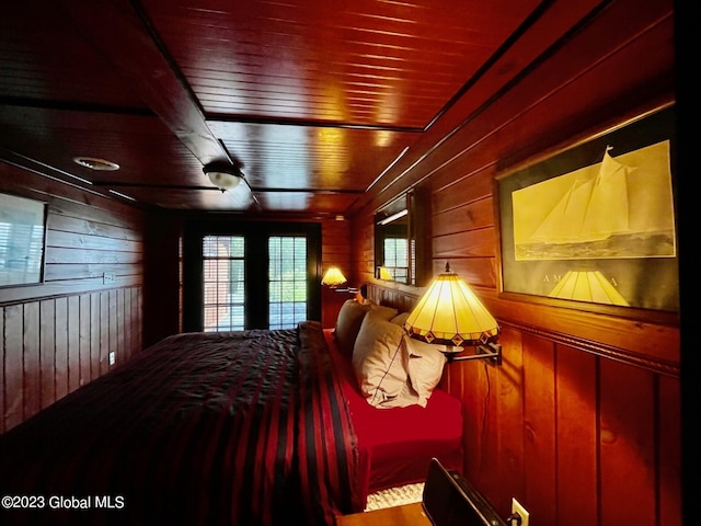 9667 Lake Shore Dr, Hague, NY 12836 - bedroom featuring wooden walls and wood ceiling