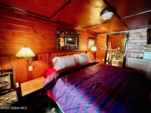 9667 Lake Shore Dr, Hague, NY 12836 - bedroom with wood walls