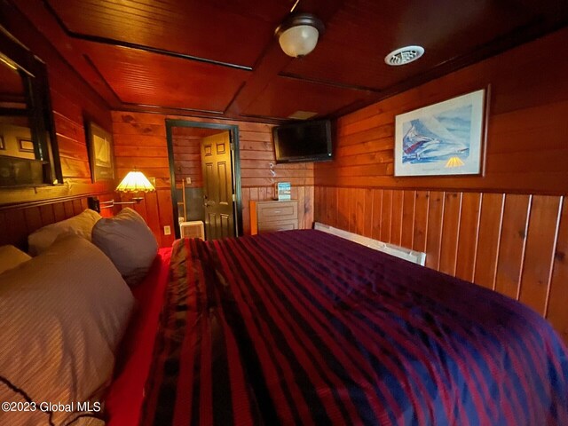 9667 Lake Shore Dr, Hague, NY 12836 - bedroom featuring wooden walls