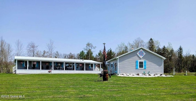 612 Oswegatchie Rd, Palatine, NY 13428 - rear view of property with a yard