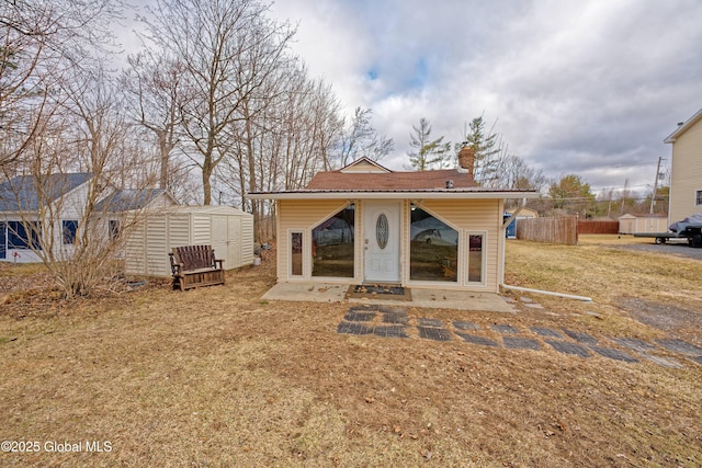 8754 Mariaville Rd, Duanesburg, NY 12137 - exterior space featuring an outbuilding, a chimney, fence, and a shed