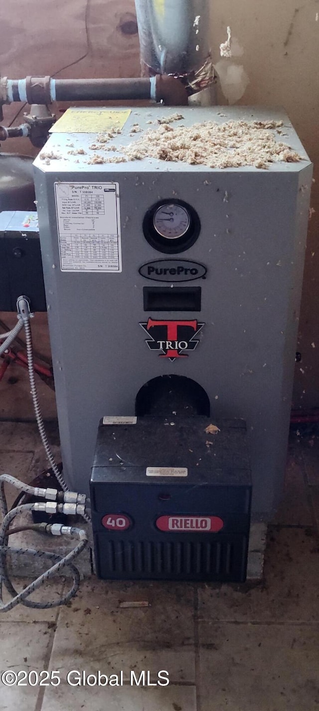 exterior details featuring a heating unit