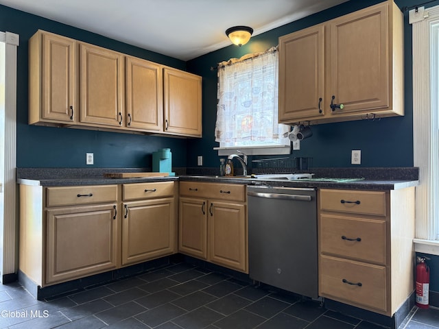 294 Main St, Hudson Falls, NY 12839 - kitchen featuring stainless steel dishwasher, dark countertops, light brown cabinets, and dark tile patterned flooring