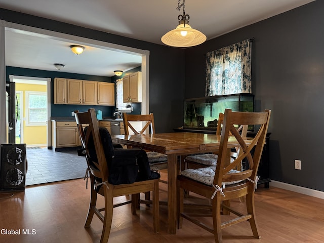 294 Main St, Hudson Falls, NY 12839 - dining area featuring light wood-style flooring and baseboards