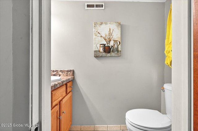 53 Harmon Rd, Glenville, NY 12302 - bathroom featuring vanity, toilet, and tile patterned floors