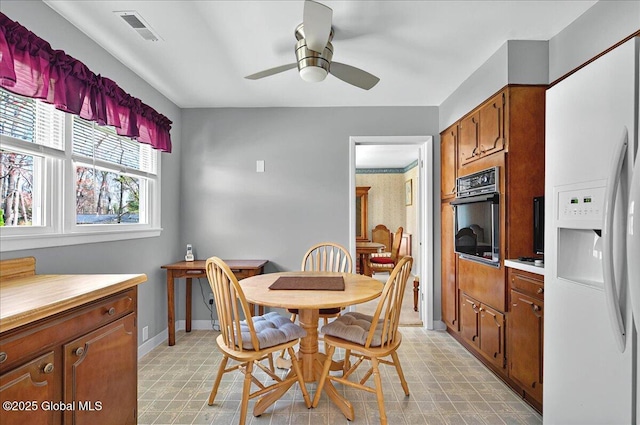 53 Harmon Rd, Glenville, NY 12302 - dining area featuring light flooring, ceiling fan, and baseboards