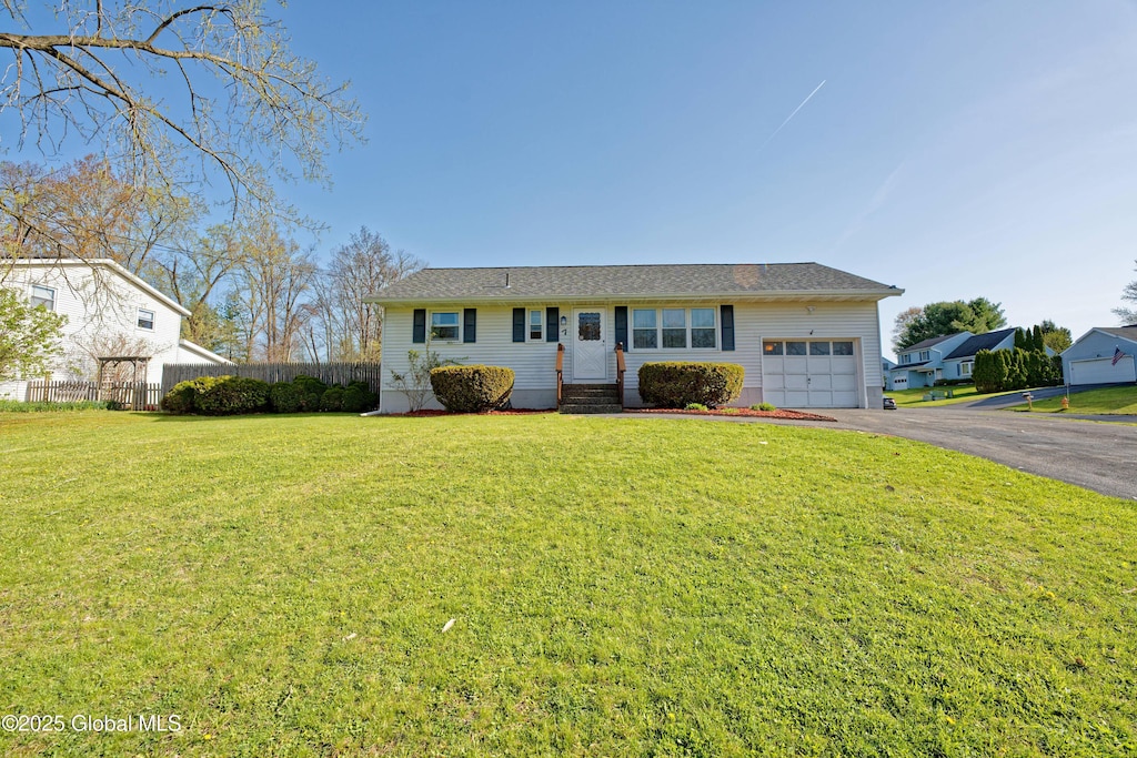 7 Red Coach Dr, Scotia, NY 12302 - ranch-style home featuring aphalt driveway, fence, a front lawn, an attached garage, and entry steps