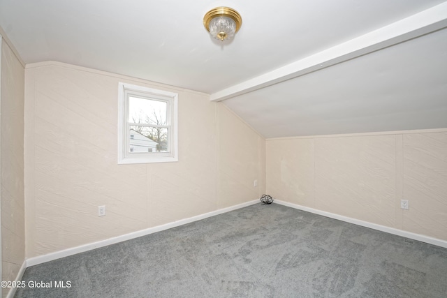 bonus room with carpet flooring, baseboards, and vaulted ceiling