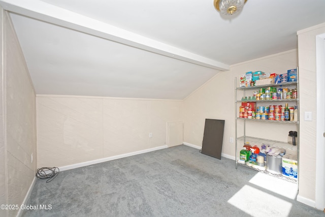 bonus room featuring baseboards, vaulted ceiling with beams, and carpet