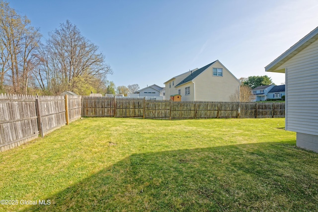view of yard featuring a fenced backyard